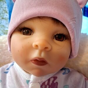 Classic Pink Hat Baby Doll with Lifelike Face